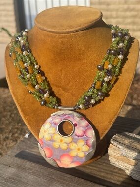 Beaded Necklace with Large Shell and Sterling Silver Flower Pendant